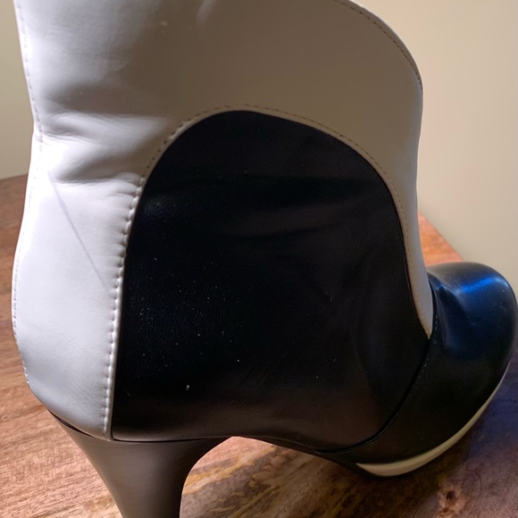 Woman’s black and white high heel booties. Approx 4 1/2 inches high. Pre-owned. - Picture 3 of 8